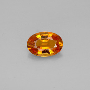 Clinohumita naranja natural de 0,93 ct, corte óvalo, VS-SI