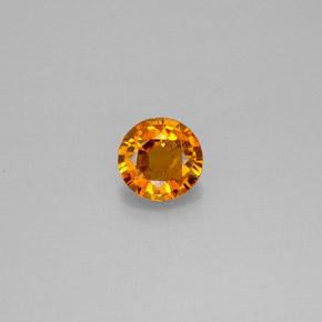 Clinohumita naranja natural de 0,57 ct, corte redondo, SI