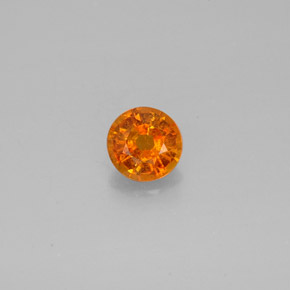 Clinohumite Naranja amarillo natural de 0.64 ct, Corte Redondo, SI