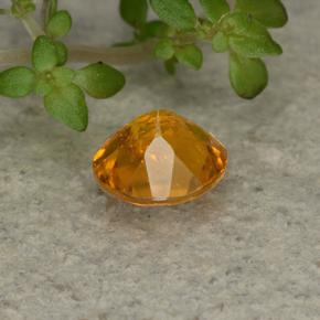 Clinohumite Naranja amarillo natural de 0.62 ct, Corte Redondo, VS-SI