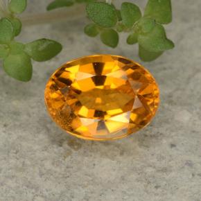 Clinohumita naranja natural de 0,84 ct, corte óvalo, VS-SI