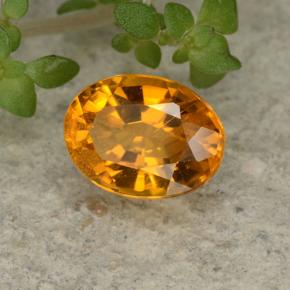 Clinohumita naranja natural de 0,84 ct, corte óvalo, VS-SI