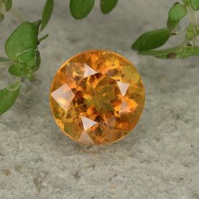 Clinohumite Naranja amarillo natural de 0.85 ct, Corte Redondo, VS-SI