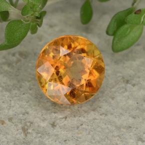 Clinohumite Naranja amarillo natural de 0.85 ct, Corte Redondo, VS-SI