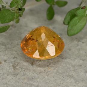 Clinohumite Naranja amarillo natural de 0.85 ct, Corte Redondo, VS-SI