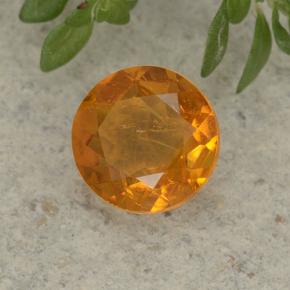 Clinohumite Naranja amarillo natural de 1.26 ct, Corte Redondo, VS-SI