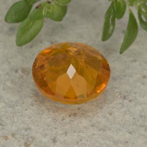Clinohumite Naranja amarillo natural de 1.26 ct, Corte Redondo, VS-SI