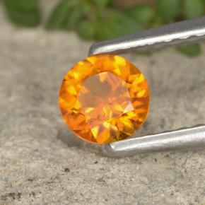 Clinohumite Naranja amarillo natural de 0.38 ct, Corte Redondo, VS-SI