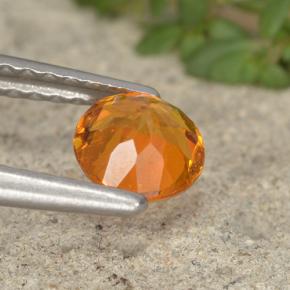 Clinohumita naranja amarillento natural de 0,55 ct, corte redondo, VS-SI