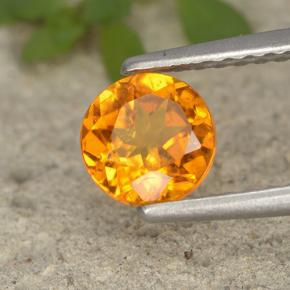 Clinohumite Naranja amarillo natural de 0.80 ct, Corte Redondo, VS-SI