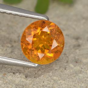Clinohumite Naranja amarillo natural de 0.86 ct, Corte Redondo, VS-SI