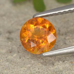 Clinohumite Naranja amarillo natural de 0.86 ct, Corte Redondo, VS-SI