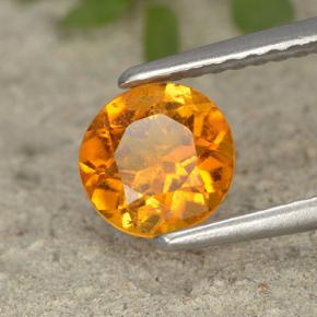 Clinohumite Naranja amarillo natural de 0.87 ct, Corte Redondo, VS-SI