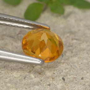 Clinohumite Naranja amarillo natural de 0.75 ct, Corte Redondo, VS-SI