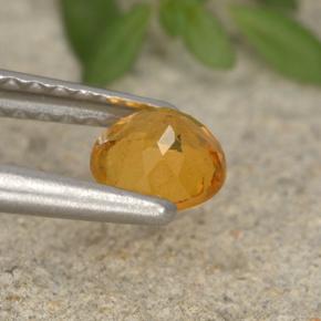 Clinohumite Naranja amarillo natural de 0.44 ct, Corte Redondo, VS-SI