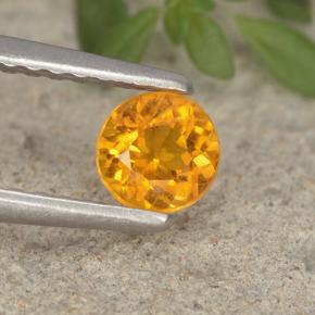 Clinohumite Naranja amarillo natural de 0.37 ct, Corte Redondo, VS-SI