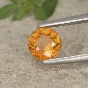 Clinohumite Naranja amarillo natural de 0.63 ct, Corte Redondo, VS-SI