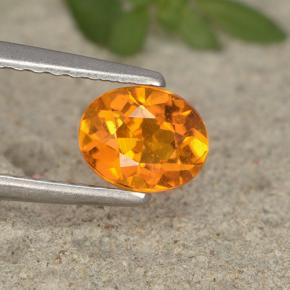 Clinohumita naranja natural de 0,62 ct, corte óvalo, VS-SI