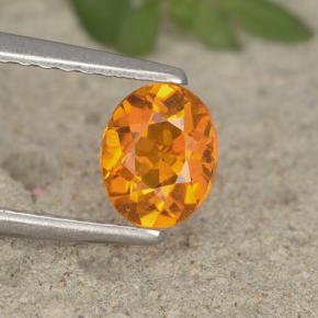 Clinohumita naranja natural de 0,62 ct, corte óvalo, VS-SI