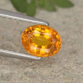 Clinohumita naranja natural de 0,91 ct, corte óvalo, VS-SI