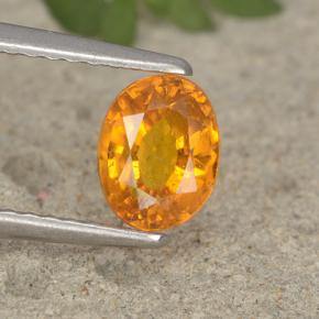 Clinohumita naranja natural de 0,91 ct, corte óvalo, VS-SI