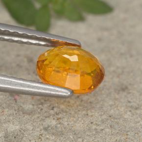Clinohumita naranja natural de 0,91 ct, corte óvalo, VS-SI