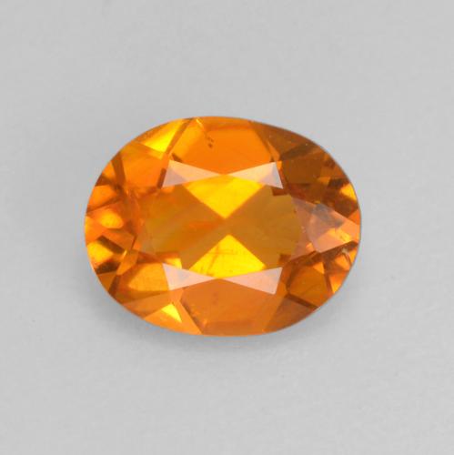 Clinohumita naranja natural de 0,52 ct, corte óvalo, VS-SI