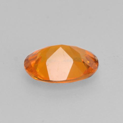 Clinohumita naranja natural de 0,52 ct, corte óvalo, VS-SI