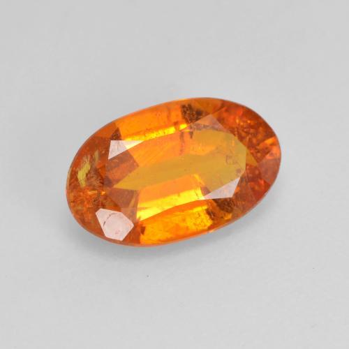 Clinohumite Naranja rojizo natural de 1.42 ct, Corte Óvalo, VS-SI
