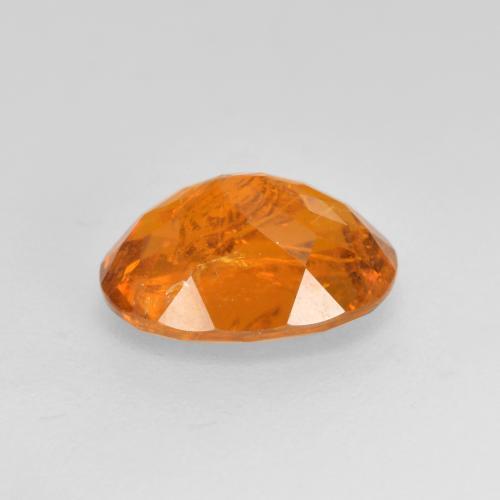 Clinohumite Ámbar naranja natural de 1.66 ct, Corte Óvalo, SI-I1