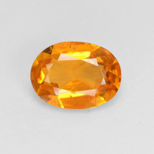Clinohumite Naranja albaricoque natural de 0.99 ct, Corte Óvalo, VS-SI