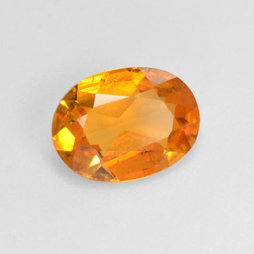 Clinohumite Naranja albaricoque natural de 0.99 ct, Corte Óvalo, VS-SI