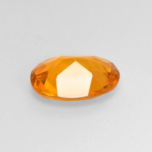 Clinohumite Naranja albaricoque natural de 0.99 ct, Corte Óvalo, VS-SI