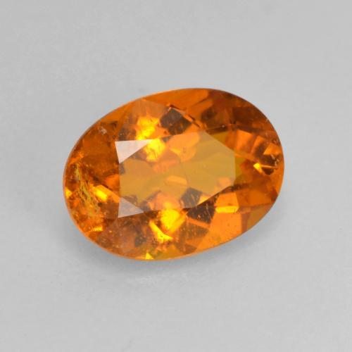 Clinohumita naranja natural de 0,82 ct, corte óvalo, SI