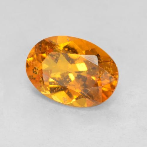 Clinohumita naranja natural de 0,85 ct, corte óvalo, SI-I1