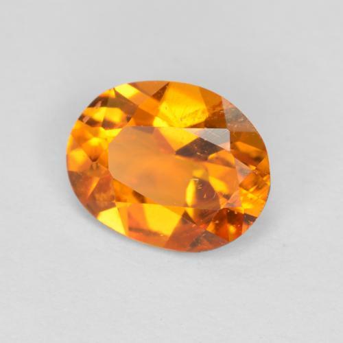 Clinohumita naranja natural de 0,68 ct, corte óvalo, SI