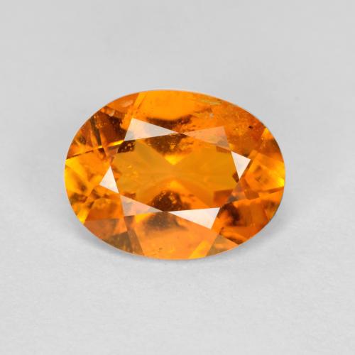 Clinohumita naranja medio natural de 1,18 ct, corte óvalo, SI-I1
