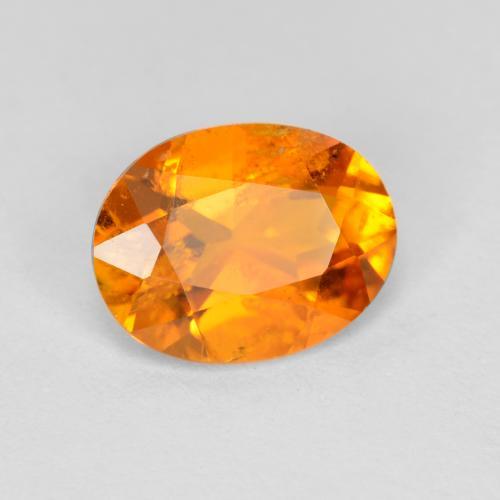 Clinohumita naranja medio natural de 1,18 ct, corte óvalo, SI-I1