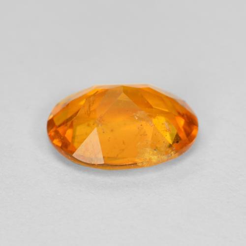 Clinohumita naranja medio natural de 1,18 ct, corte óvalo, SI-I1