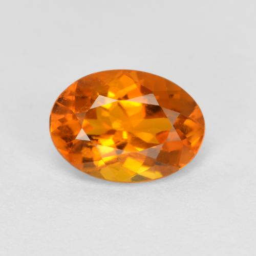 Clinohumita naranja natural de 0,74 ct, corte óvalo, SI