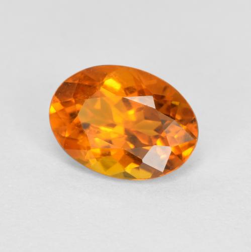 Clinohumita naranja natural de 0,74 ct, corte óvalo, SI
