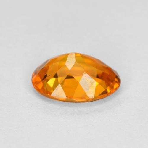 Clinohumita naranja natural de 0,74 ct, corte óvalo, SI