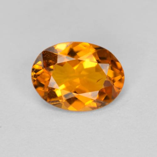 Clinohumite Naranja albaricoque natural de 0.66 ct, Corte Óvalo, VS