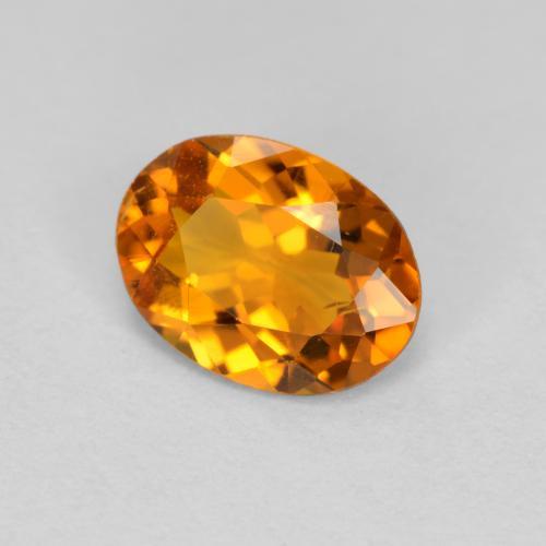 Clinohumite Naranja albaricoque natural de 0.66 ct, Corte Óvalo, VS
