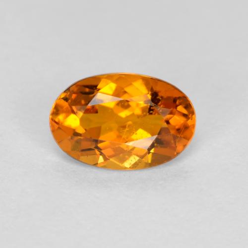 Clinohumite Naranja oscuro natural de 0.41 ct, Corte Óvalo, VS-SI