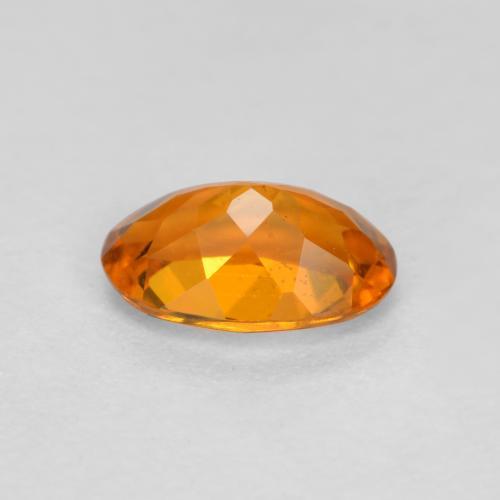 Clinohumite Naranja oscuro natural de 0.41 ct, Corte Óvalo, VS-SI