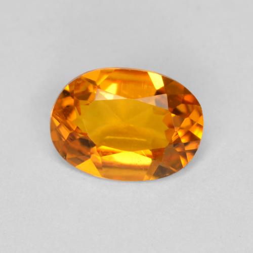 Clinohumita naranja natural de 0,41 ct, corte óvalo, VS