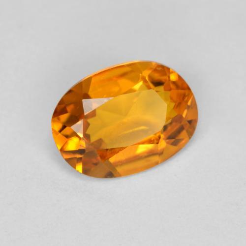 Clinohumita naranja natural de 0,41 ct, corte óvalo, VS