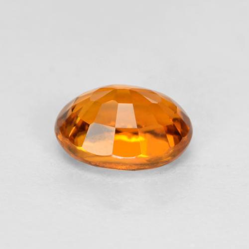 Clinohumite Naranja albaricoque natural de 0.38 ct, Corte Óvalo, VS