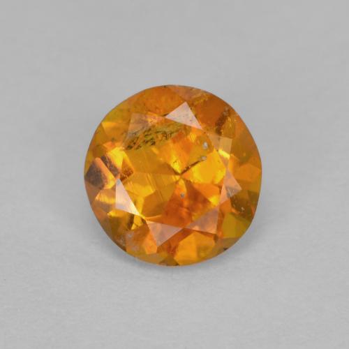 Clinohumita naranja medio natural de 0,63 ct, corte redondo, SI